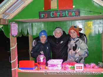 Cars lined up around the block for Sainte-Lucie Christmas Market