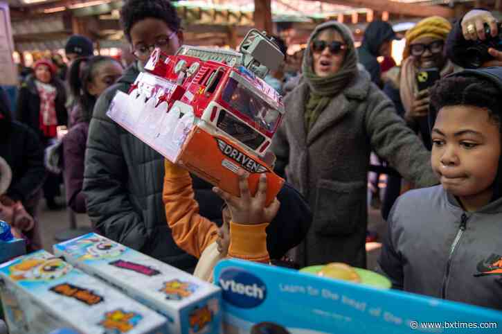 Bronx veterans and family enjoy a toy giveaway and a trip to the zoo