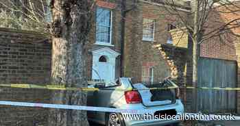 Three taken to hospital after car crashes through wall in Hampstead