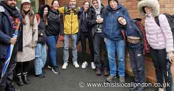 Volunteers collect hundreds of food items for charity - and deliver them by hand