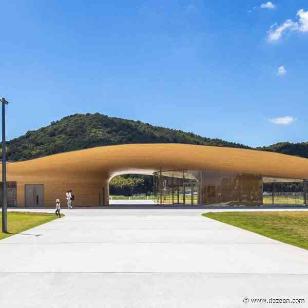 Kengo Kuma tops sculptural community centre with swooping bamboo roof