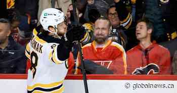 David Pastrnak scores in OT as Bruins rally to beat Flames 4-3