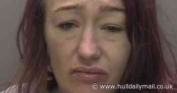 Woman flees to roof for four hours after stabbing another woman's hand