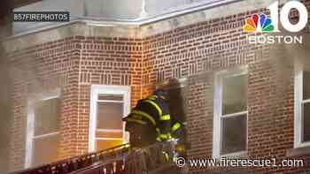 Mass. firefighters rescue occupant from burning apartment building