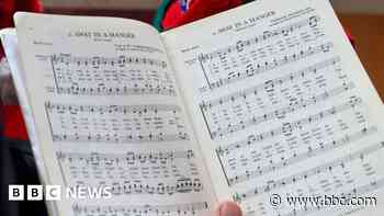 Fake carol singer with kids steals cash and tech