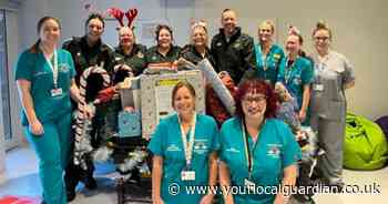 Paramedics deliver Christmas presents to poorly kids at Croydon Hospital