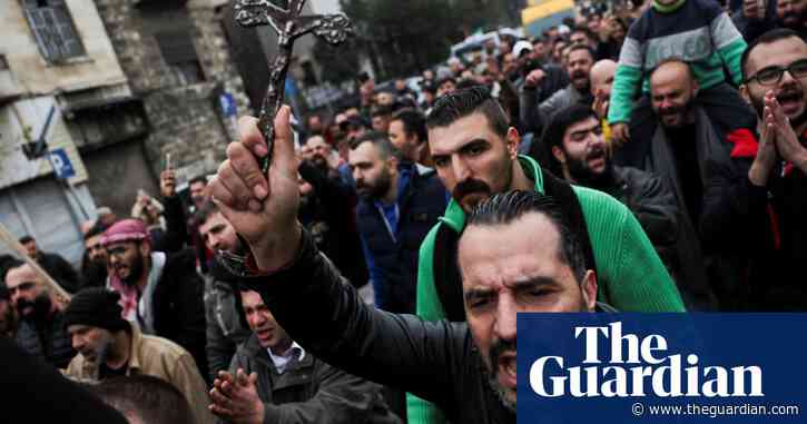 Hundreds protest in Christian areas of Syrian capital after Christmas tree burned