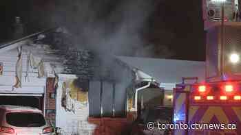 Man dead, woman in hospital after overnight housefire in Scarborough