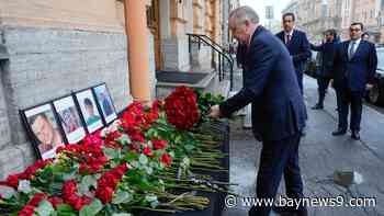 Azerbaijan observes day of mourning for air crash victims as speculation mounts about its cause