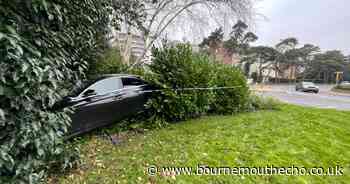 PHOTOS: Mercedes crashed and ditched on roundabout