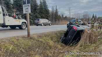 Motorists passing collision charged with distracted driving