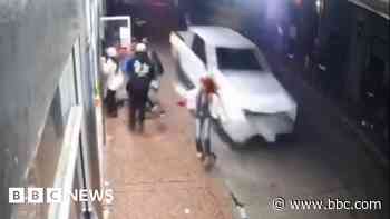 Watch: CCTV shows the moment people escaped the path of truck by inches
