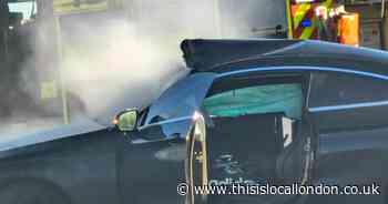 Car on fire after crash blocks major carriageway near Romford