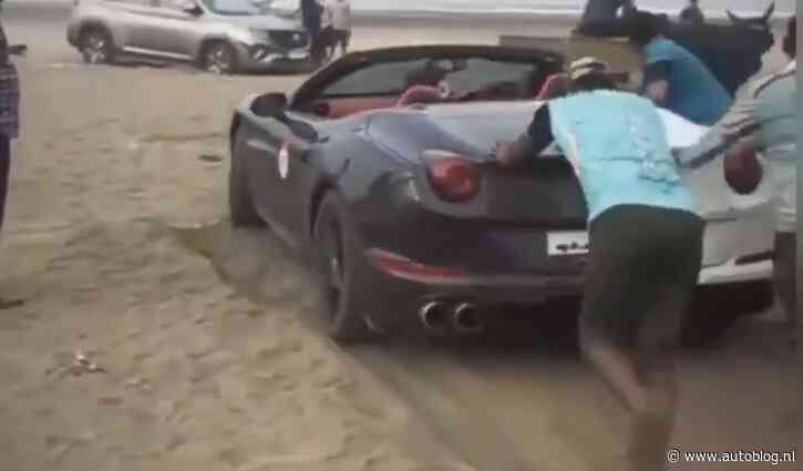 Goh! Met een Ferrari het strand op gaan is geen goed idee