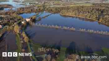 Drone footage shows extent of canal-breach flooding