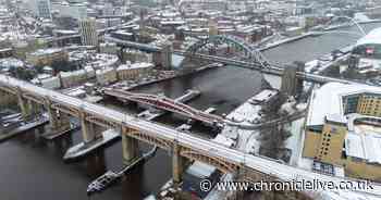 Drone pictures show River Tyne's famous bridges dusted in snow