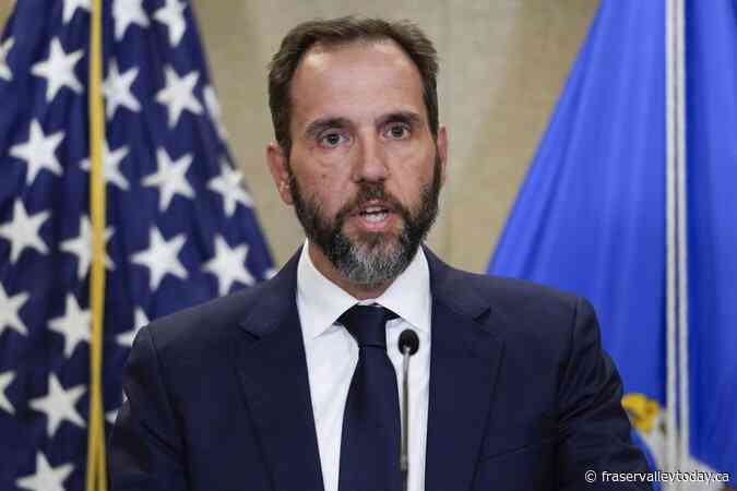 Judge temporarily blocks release of special counsel report on Trump cases amid simmering court fight