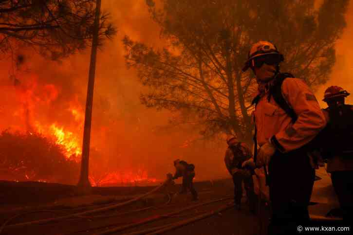 California governor says Pacific Palisades wildfire has destroyed many structures as winds kick up