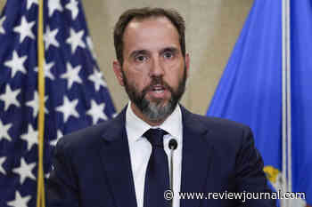 Part of special counsel’s Trump report will be released for now, DOJ says