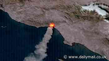 See the LA wildfires from SPACE: Satellite images reveal just how quickly blazes exploded over the last two days thanks to powerful Santa Ana winds