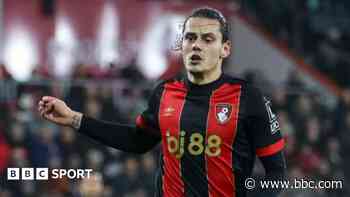 Bournemouth striker Unal tears ACL in training