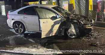 Car gutted by flames after blaze at petrol station