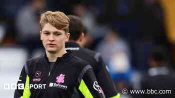 Tottenham midfielder Craig joins Mansfield