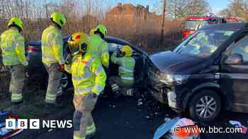 Firefighters rescue man from car after crash