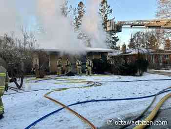 Ottawa firefighters uninjured after tumbling through floor of burning home