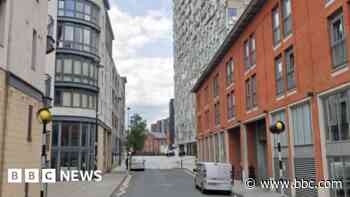 Man arrested after woman driven at and assaulted