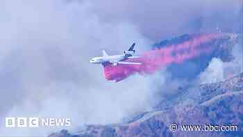 Watch: Huge clouds of water and fire retardant dumped on LA wildfires