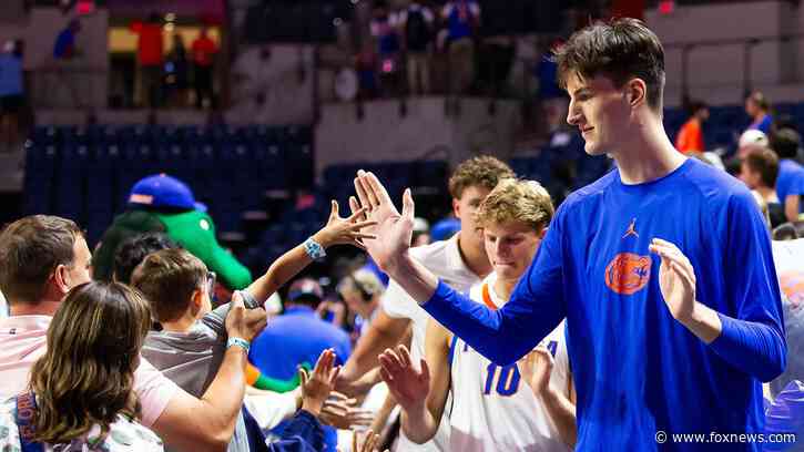 Florida's 7-foot-9 center meets Shaq in epic video: 'Pick on someone your own size'
