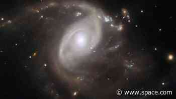 Hubble Telescope sees rare supernova explosion as a violent 'pale blue dot' (image)