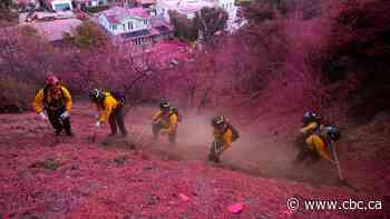 What is the pink powder fire crews are dropping on L.A., and how does it work?