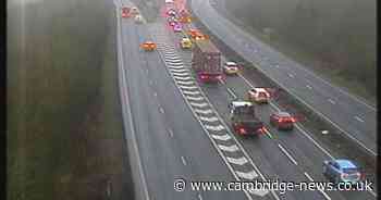 Man taken to hospital and A14 closed after three-vehicle crash