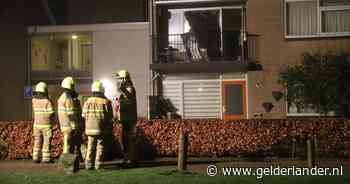 Flinke schade na explosie in appartement aan de Molenstraat in Dreumel