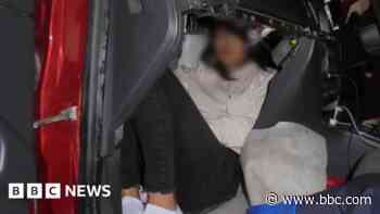 Traffickers caught after woman found in glove box