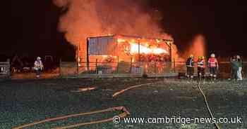 Firefighters tackle huge barn blaze in Cambridgeshire village