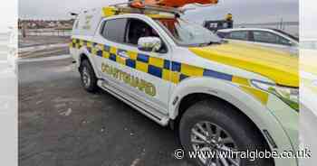 Dogwalkers stranded by tide near Wirral lighthouse