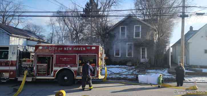 Crews respond to house fire in New Haven