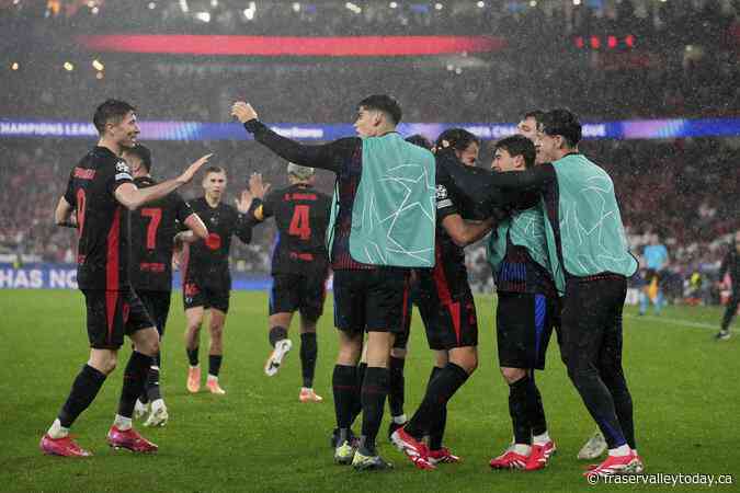 Liverpool beats Lille to reach Champions League round of 16. Barcelona wins 9-goal thriller