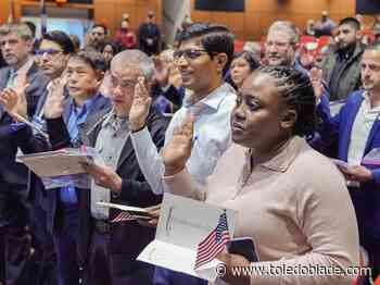 40 new citizens naturalized in ceremony at library