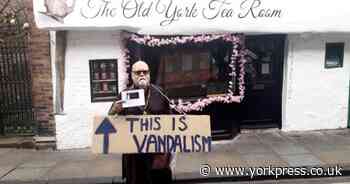 'Why protest over tea room sign but not Minster solar panels nor Spark?'