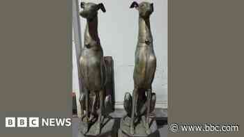Search for owner of suspected stolen dog statues