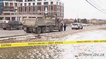 Woman dead after being struck by dump truck in Mississauga, police say