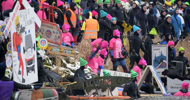 Fast 2.000 Mutige schwimmen in frostiger Donau