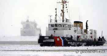 Freighter on the move after it was freed from ice on frozen Lake Erie