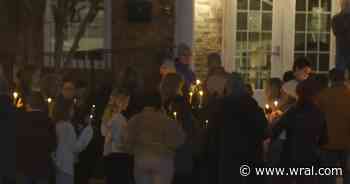 Renaissance Park neighbors hold vigil for officer injured in shooting that killed man & suspect