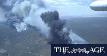 ‘Too late to leave’ as firefighters face dangerous conditions despite cool change