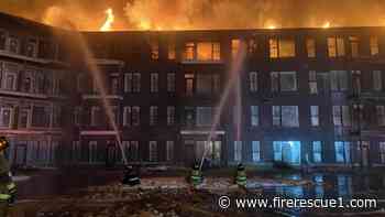 Ohio FDs battle an apartment complex construction site fire in freezing weather